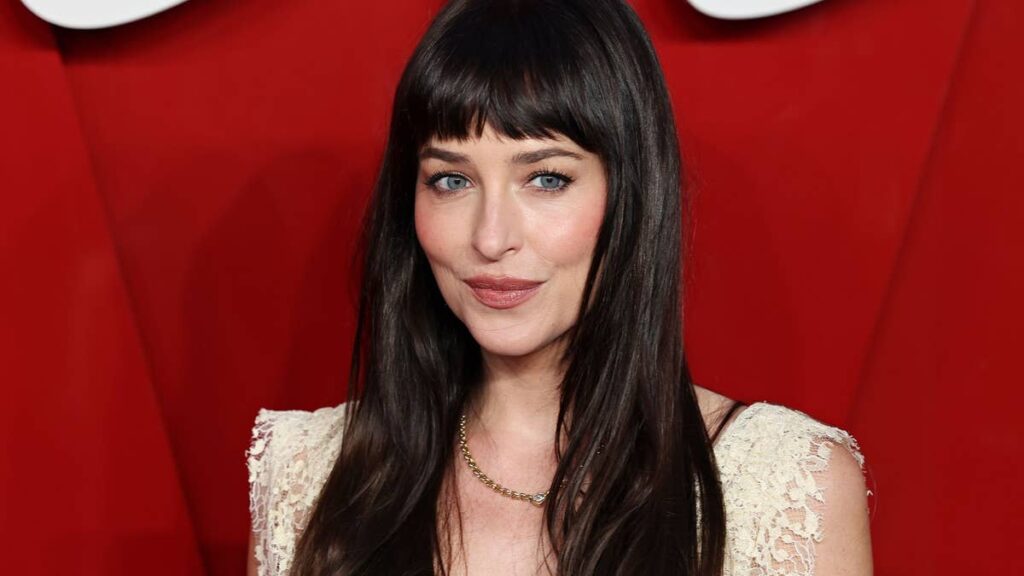 Dakota Johnson is a red-carpet vixen in underwear-exposing lace dress with plunging neckline