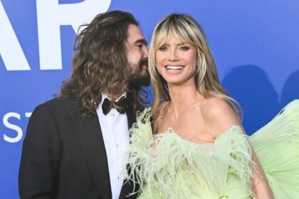 Heidi Klum shares topless photos as she enjoys romantic vacation with famous husband