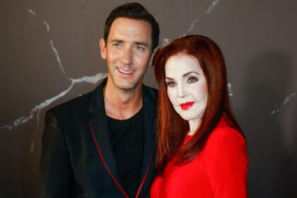 Priscilla Presley turns heads in vibrant red gown during rare appearance at glamorous Mallorca event
