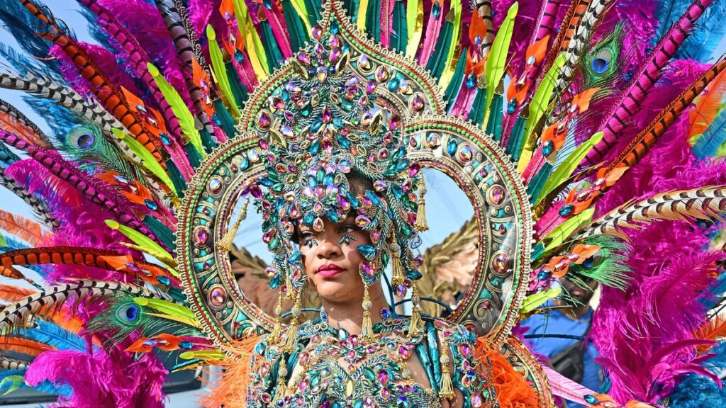 Rihanna wears revealing and fearless jewel-encrusted costume at Barbados carnival parade