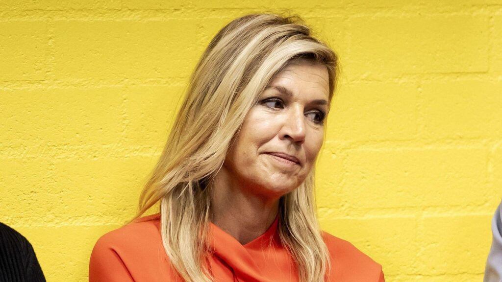 Queen Máxima moved by soccer players’ emotional stories during colorful stadium appearance