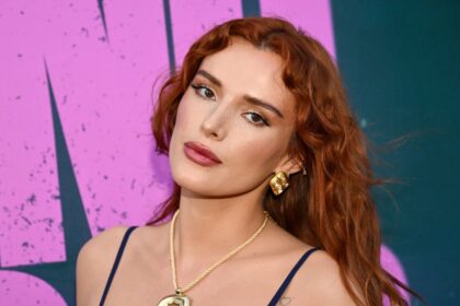 Bella Thorne stuns in shimmering green bikini with fiancé Mark Emms