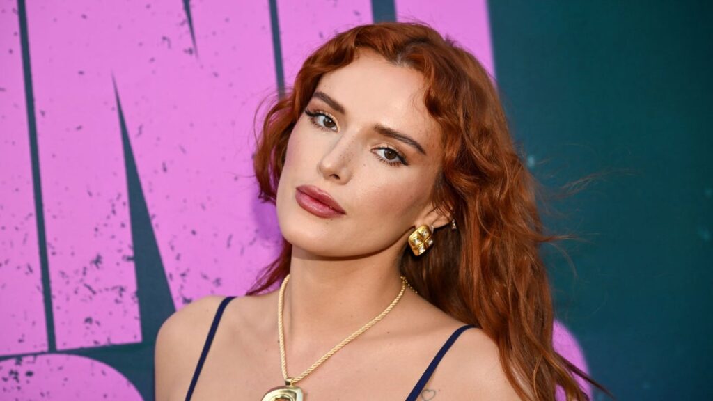 Bella Thorne stuns in shimmering green bikini with fiancé Mark Emms