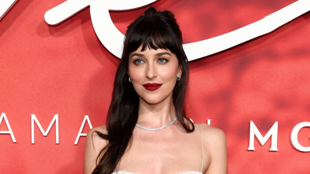 Dakota Johnson sizzles in ab-baring embellished gown with bold red lip
