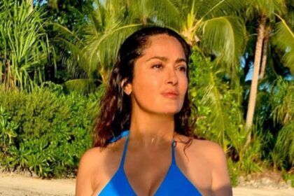 Salma Hayek, 60, stuns in topless beach photos as she enjoys naked swim