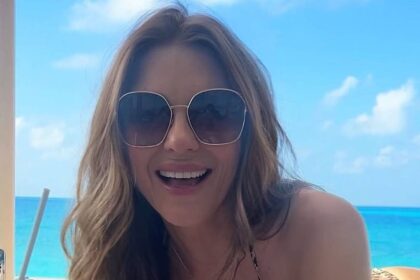 Elizabeth Hurley, 61, turns heads in a peach bikini as she soaks up the California sunshine
