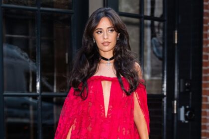 Camila Cabello turns up the heat in a barely-there floral string bikini and a flirty sheer mini dress