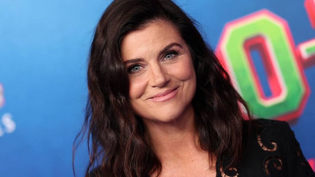 Tiffani Thiessen, 52, sizzles in olive green bathing suit during family’s lakeside vacation