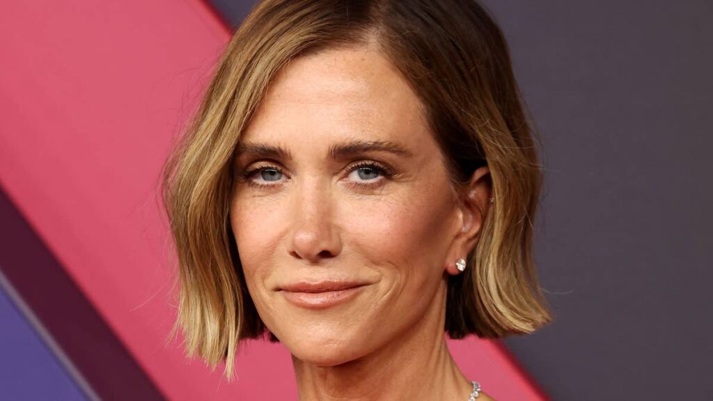 Kristen Wiig, 53, stuns in black bra and lace stockings for sultriest poolside pictures