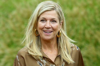 Queen Máxima transforms her silky brown dress with one bold statement accessory amid busy royal week