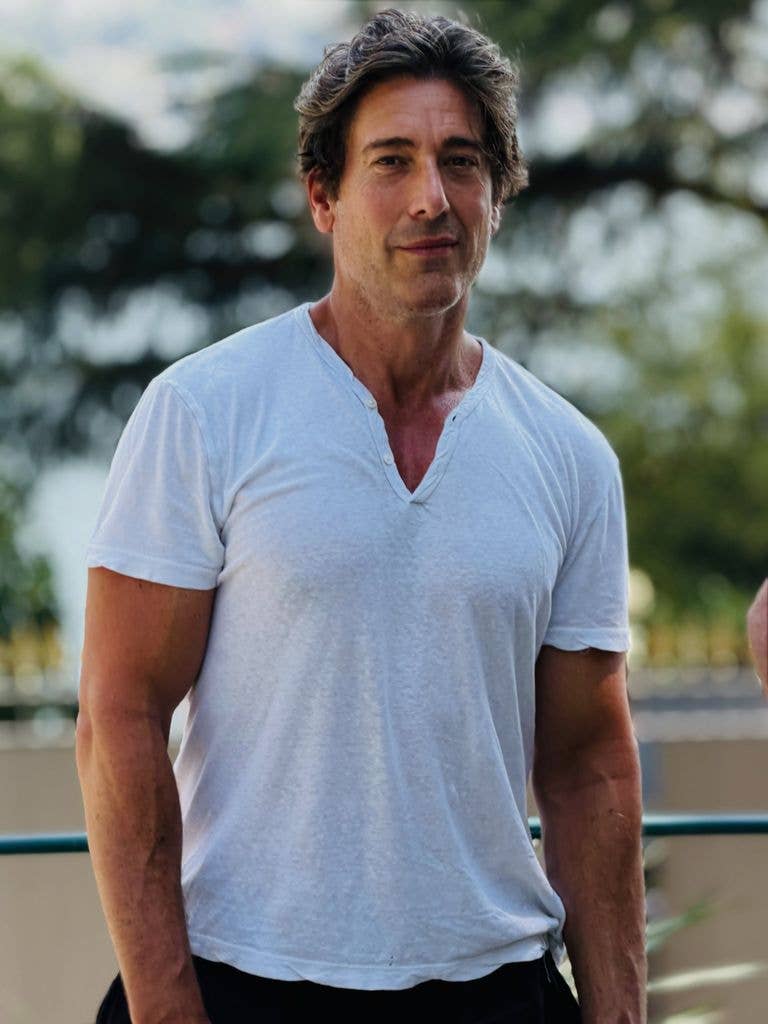 David Muir lets hair loose in rugged new photo after Italian vacation