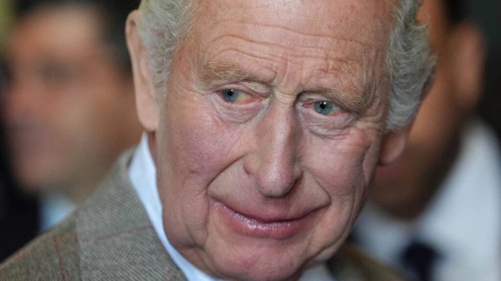 King Charles pictured using unusual walking stick to keep his balance
