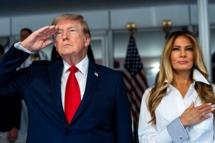 What Donald Trump and Melania appeared to whisper during ‘intense’ VIP suite exchange