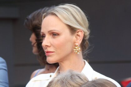 Princess Charlene adds a golden touch to sophisticated power suit for palace appearance