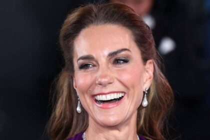 Kate Middleton wears sentimental royal jewels as she glides into Digger premiere in floor-skimming gown