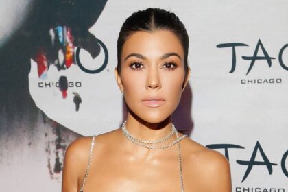 Kourtney Kardashian, 47, turns heads in barely-there silver bikini during lavish escape