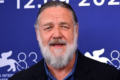 Russell Crowe showcases dramatic weight loss alongside younger girlfriend and rarely-seen son