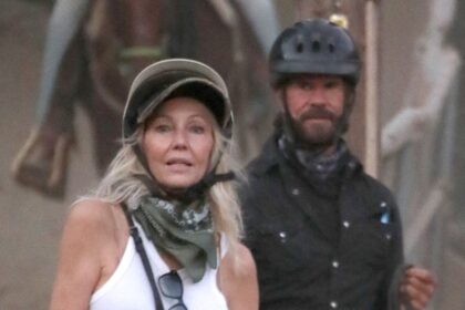 Heather Locklear and Lorenzo Lamas saddle up and smooch ahead of her 64th birthday