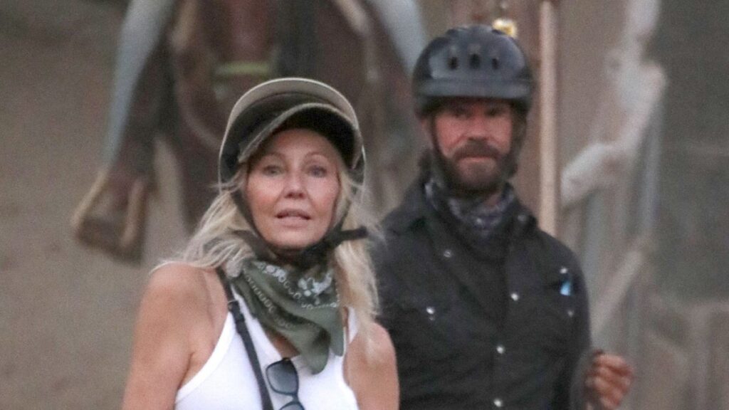 Heather Locklear and Lorenzo Lamas saddle up and smooch ahead of her 64th birthday