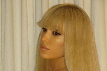 Bianca Censori sizzles in barely-there golden micro bikini