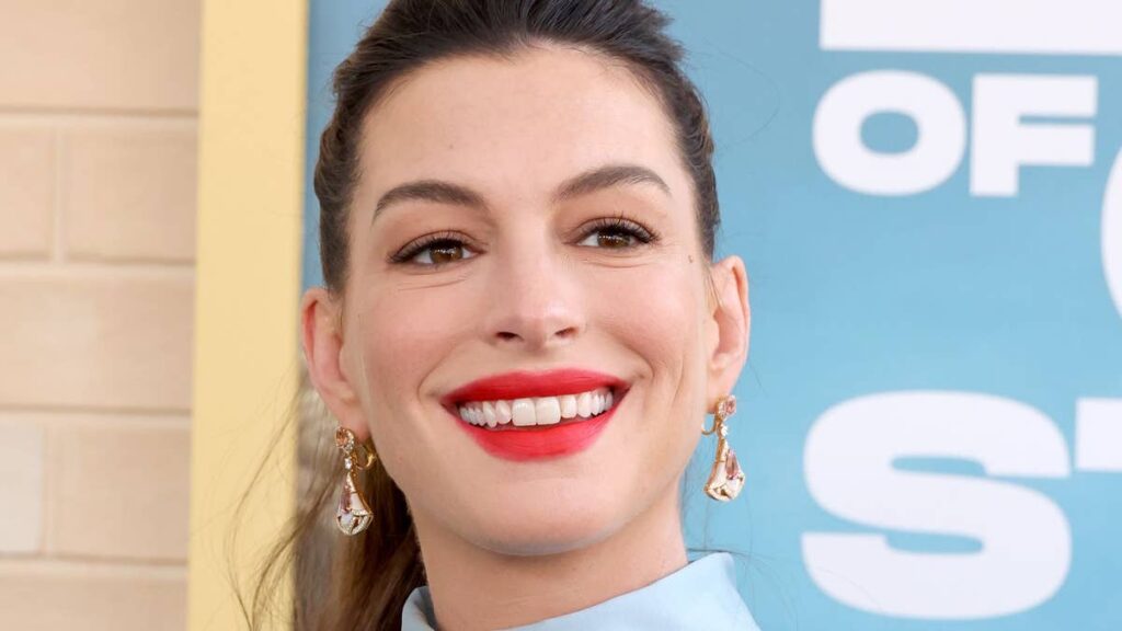 Anne Hathaway bares growing baby bump in daring look after baby confession