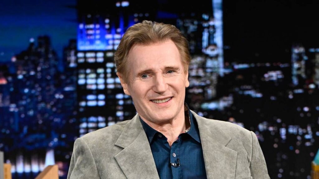 Liam Neeson, 74, holds hands with striking younger costar for red carpet appearance