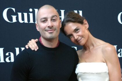 Katie Holmes makes loved-up red carpet debut with boyfriend Jason Bard Yarmosky