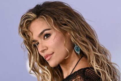Karol G breaks down in tears after emotional message to fans during concert