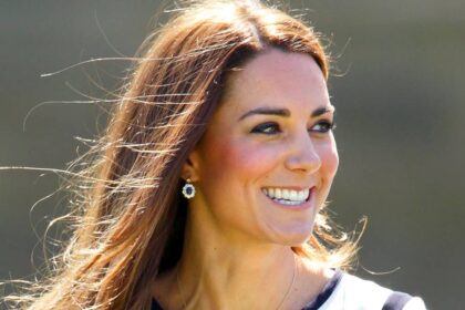 Kate Middleton’s modellesque legs have never looked better in mini coat-dress and knee-high boots