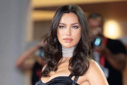 Irina Shayk shows off sculpted abs in daring lingerie look