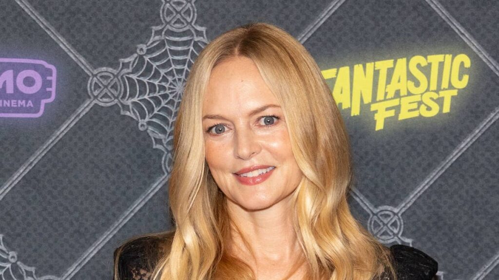 Heather Graham, 56, shows off incredible figure in sheer gothic dress