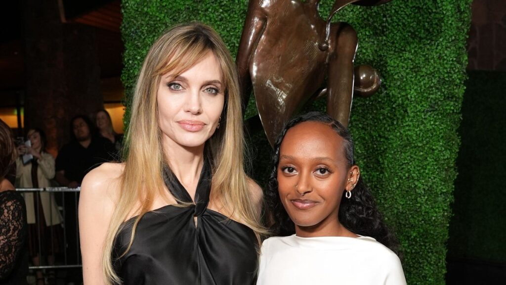 Angelina Jolie and Zahara hold hands and match in stunning black looks
