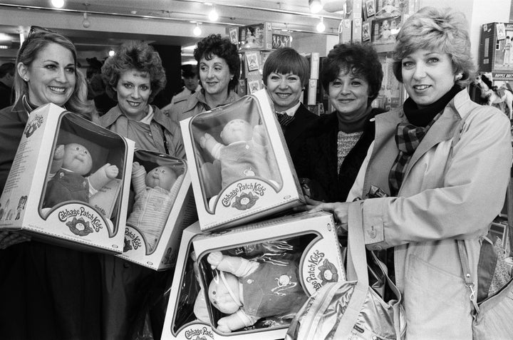 Before there were Labubu dolls, there were Cabbage Patch Dolls. Here, shoppers in Dallas pick some up in 1983.