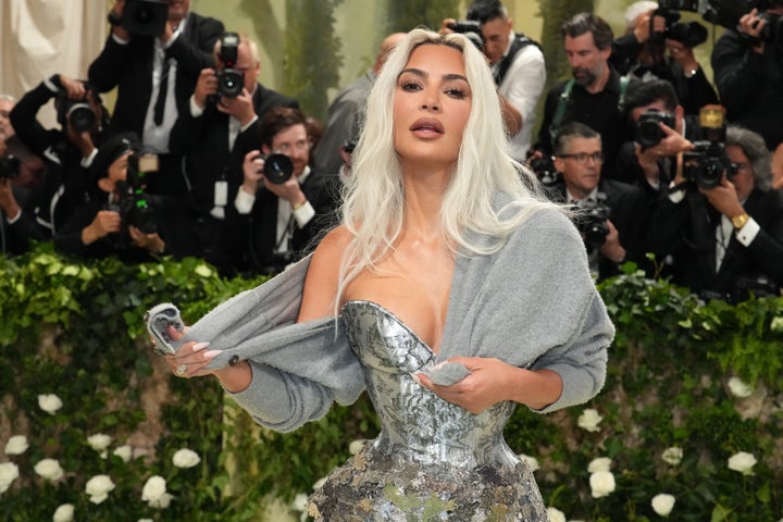 Kardashian’s very tight corset at the 2024 Met Gala celebrating "Sleeping Beauties: Reawakening Fashion."