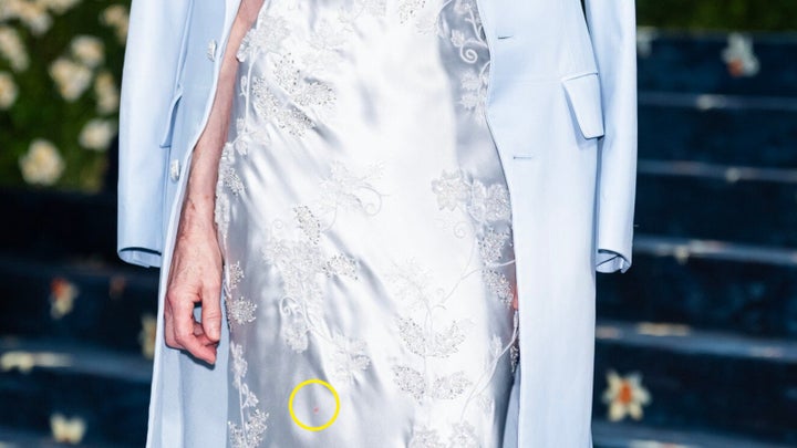The tiny red spot of Wintour’s gown.