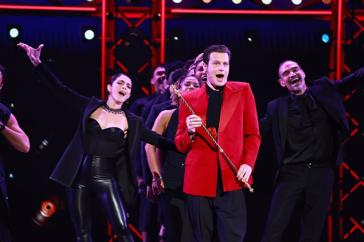 Jonathan Groff winked at the royal garb of his character, King George III, by donning a red blazer.
