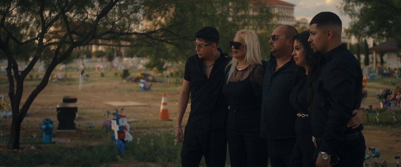 Maria Peña, Jennifer Peña and the rest of their family visit Rudy Peña's grave in Netflix's "Trainwreck: The Astroworld Tragedy" documentary.