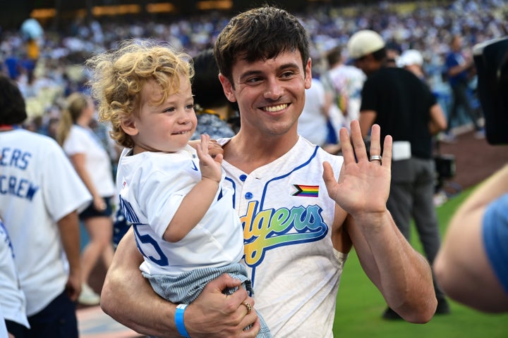 “If I could be half the dad my dad was to me, I feel like my life would be complete,” said Daley, seen here with his 1-year-old son, Phoenix.