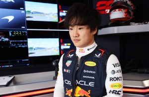 A still image of Yuki Tsunoda in a garage prior to the F1 Grand Prix of Canada at Circuit Gilles-Villeneuve.