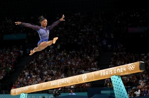 PARIS, FRANCE - AUGUST 01: Simone Biles of Team United States competes on the balance beam during the Artistic Gymnastics Women's All-Around Final on day six of the Olympic Games Paris 2024 at Bercy Arena on August 01, 2024 in Paris, France. (Photo by Jamie Squire/Getty Images)